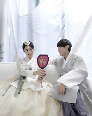 Visitors wearing Korean wedding hanbok in Busan