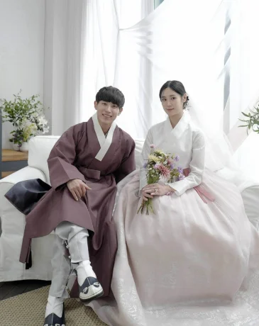 Visitors wearing Korean wedding hanbok in Busan