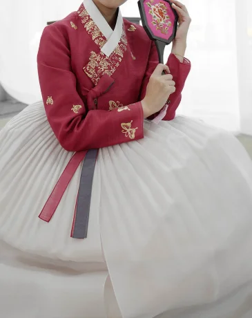 Visitor wearing Korean wedding hanbok in Busan