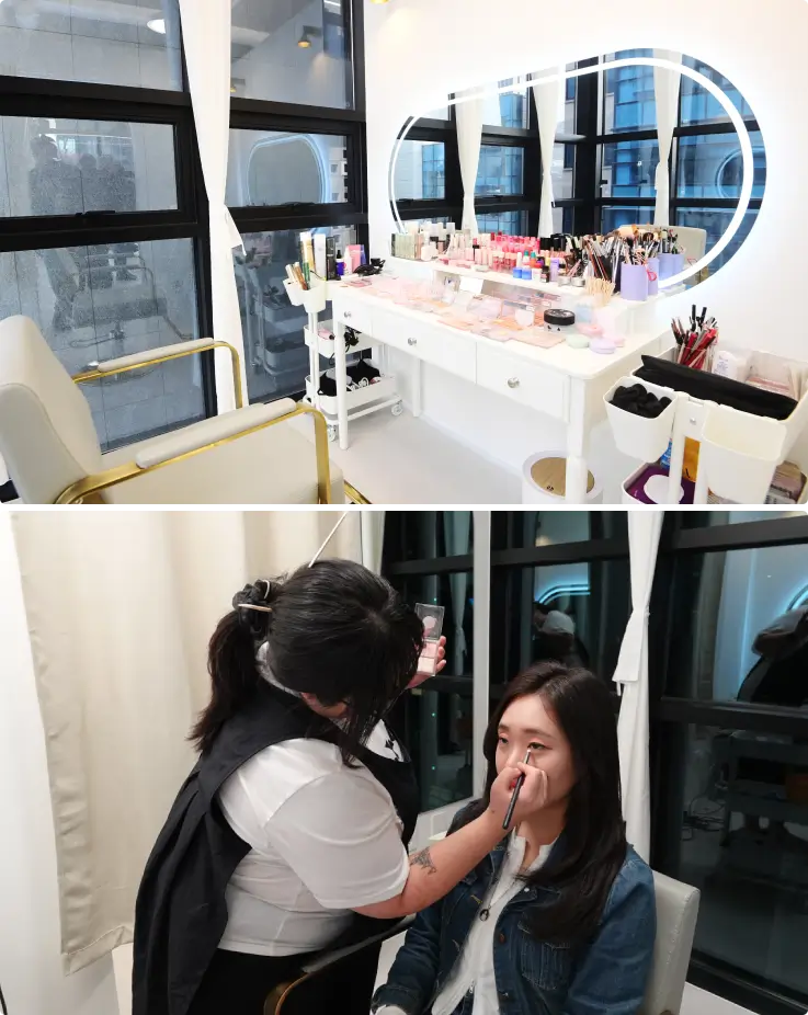 The vanity table is on top, and a customer is getting her makeup done on below.