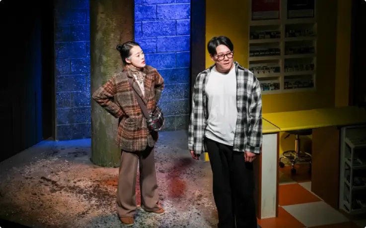 Actors performing in The Last Chance Convenience Store on stage