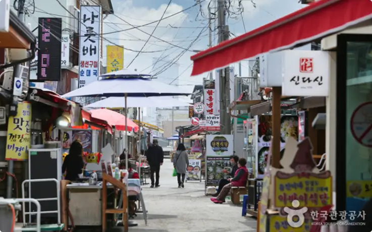 Traditional shops at Abai Village, reflecting its North Korean refugee heritage.
