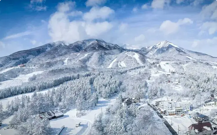 Snowy slopes and mountain scenery at Akakura Onsen Ski Area, Niigata.