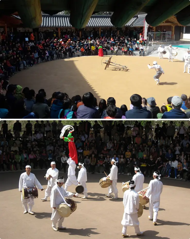 Hahoe mask dance performance accompanied by traditional Korean instruments.