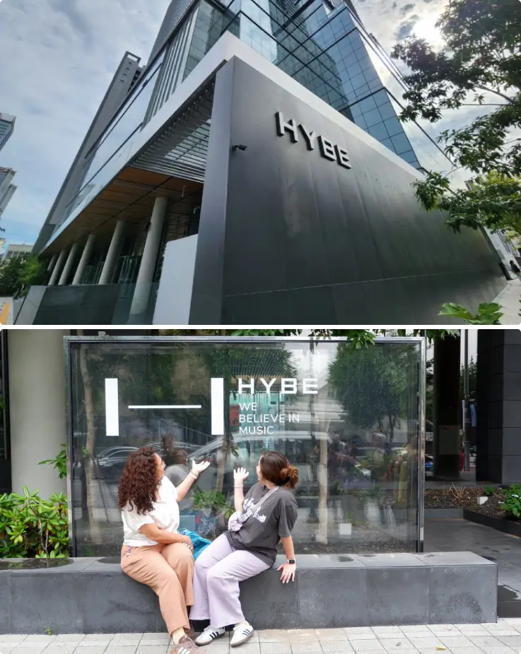 ARMYs visiting HYBE headquarters during a BTS fan tour in Seoul.