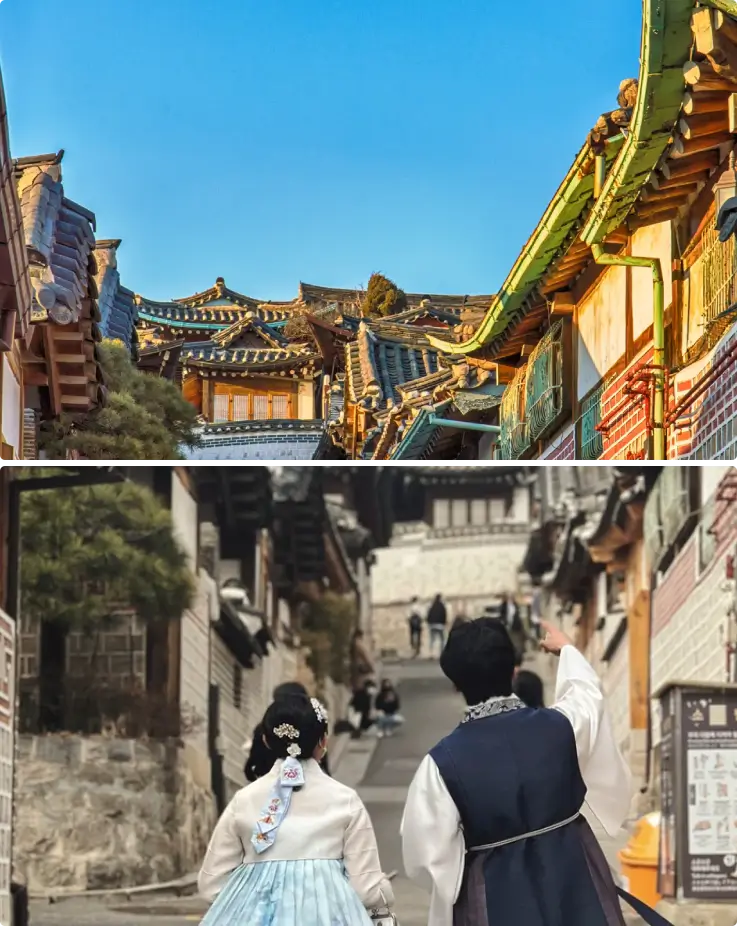 A couple exploring Bukchon Hanok Village in traditional Hanbok attire.
