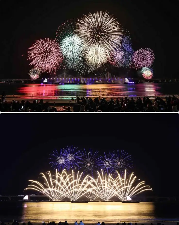 Fireworks bursting over Gwangalli Bridge during the Busan Fireworks Festival at night