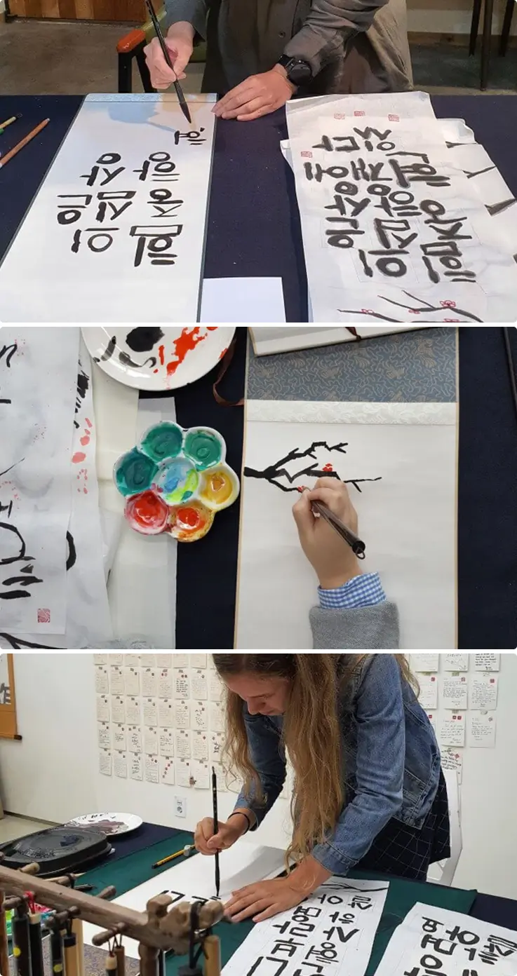 Students participating in a Korean Calligraphy & Hanging Scroll Making Class in Insadong.