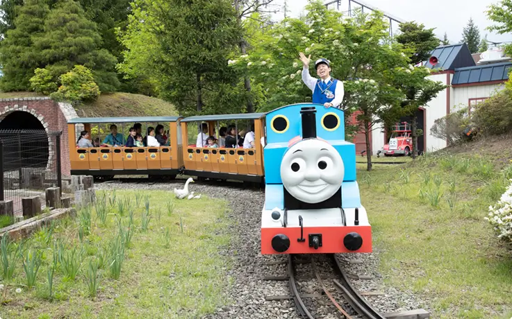 Children riding the Thomas Train in Thomas Land at Fuji-Q Highland.