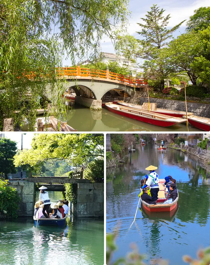 Boatmen navigating pasengers along the Yanagawa Canal on a river cruise ride.