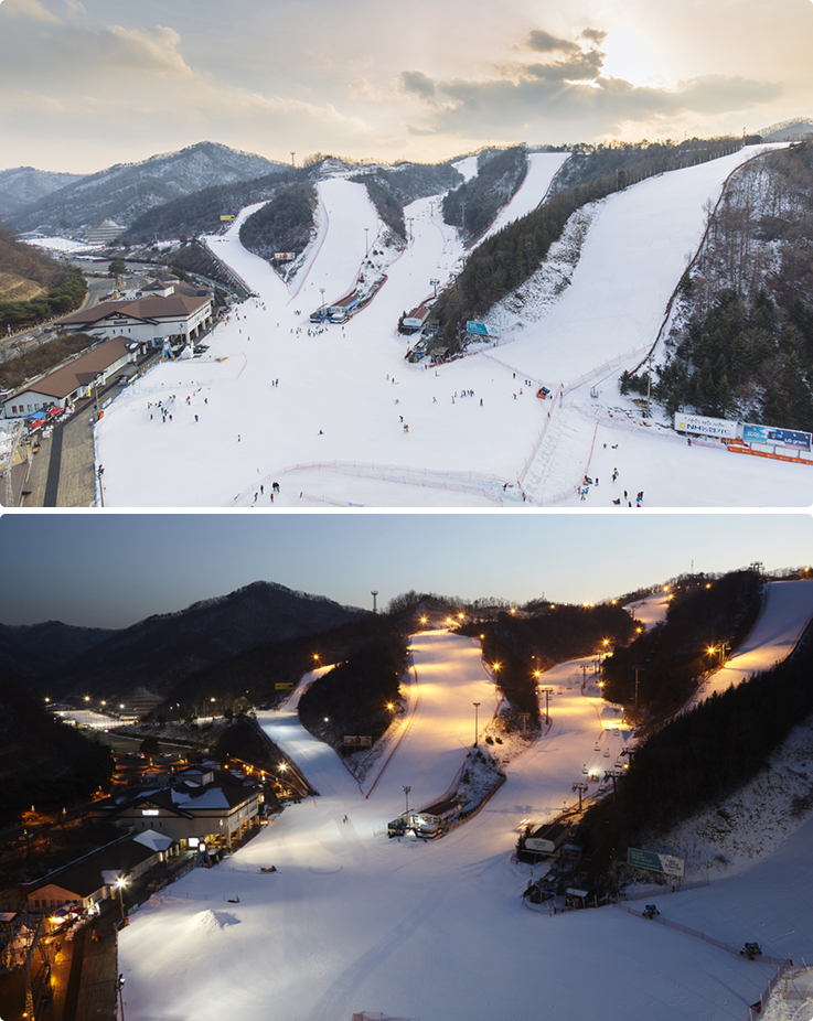 Wide view of Elysian Gangchon Ski Resort featuring snow-covered slopes and surrounding mountain scenery.