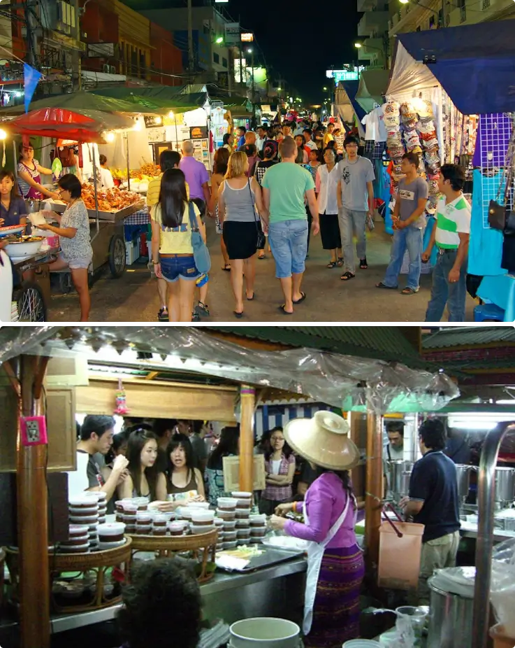 Tourists walking through the stalls of Hua Hin Night Market.