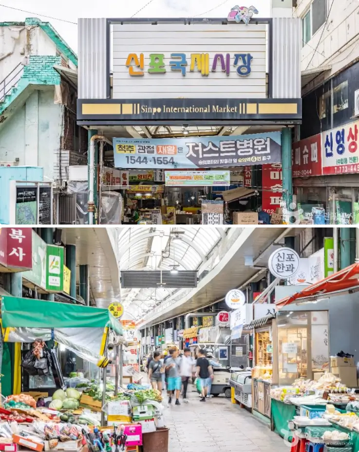 Market alley with food stalls and local vendors at Sinpo International Market in Incheon.