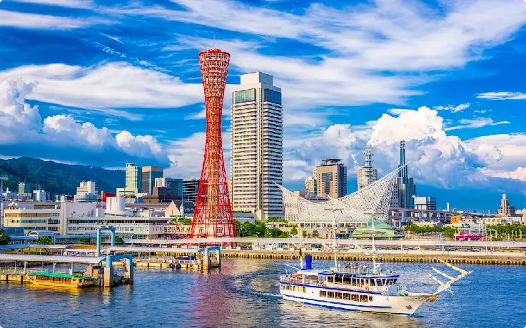 Kobe Harborland waterfront with city skyline and Ferris wheel.
