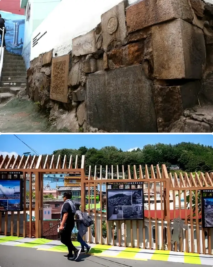 Narrow alleyways of Amidong Tombstone Village in Busan with stone walls and traditional hillside houses