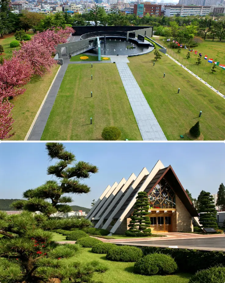 Rows of white grave markers at UN Memorial Cemetery in Busan surrounded by green lawns and Korean flags