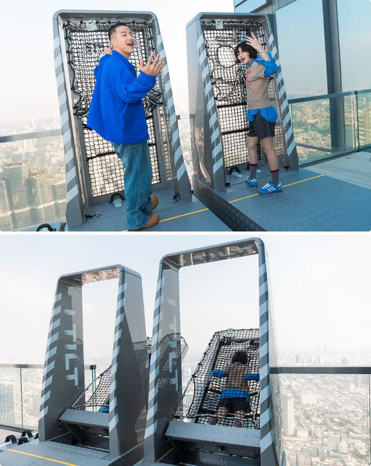 Participants experiencing I-Tilt on the 75h floor of King Power Mahanakhon Skywalk
