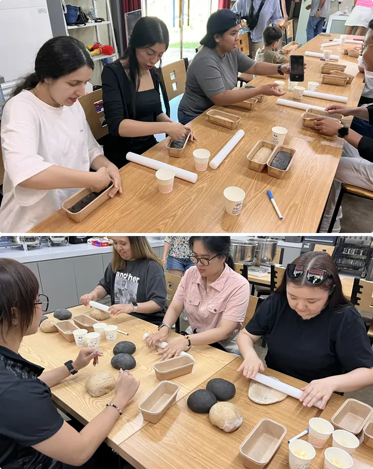 Visitors making traditional bread at Soldabak Experience Village in Muju.