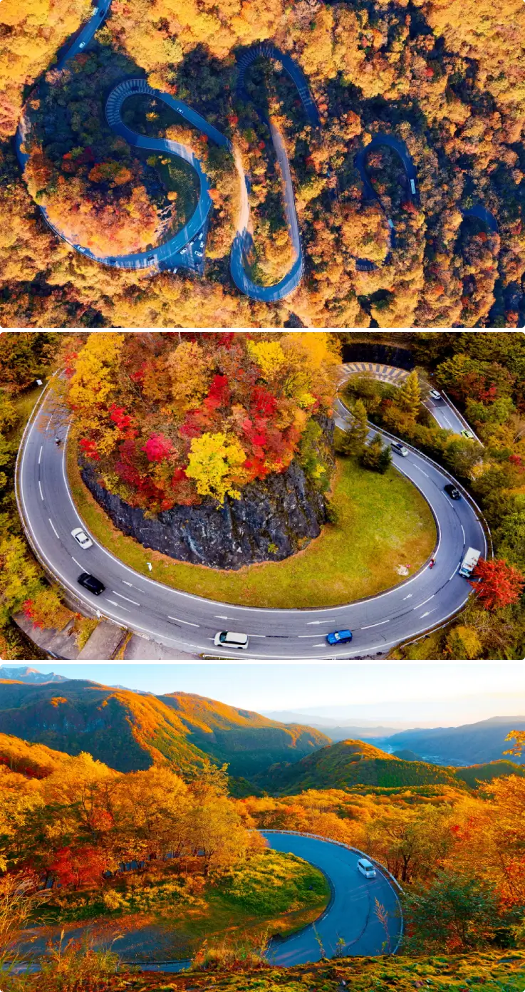 Aerial view of Nikko Irohazaka Slope with winding curves through autumn foliage