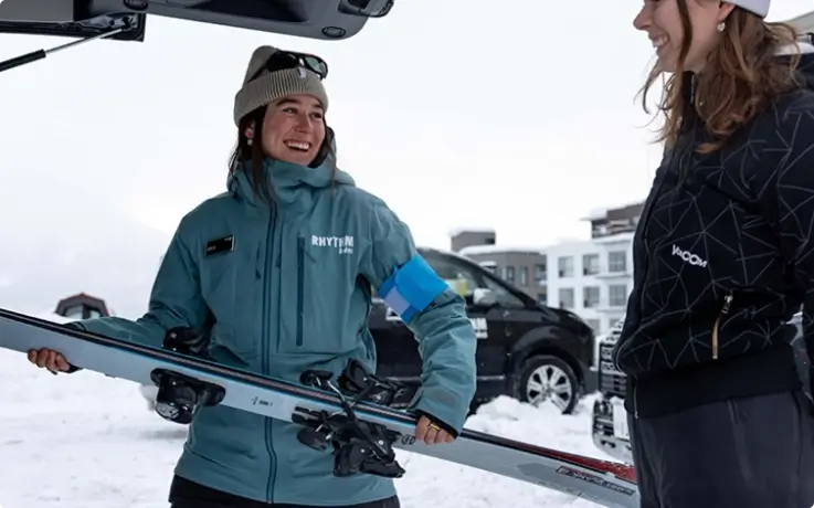 Friendly ISIA certified instructor greeting her students for a private ski lesson in Niseko.