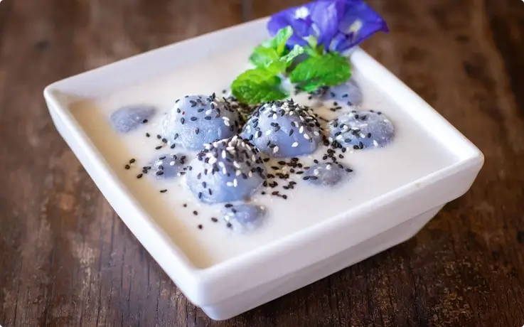 Black sticky rice in coconut milk made at Baan Farm Thai Cooking School
