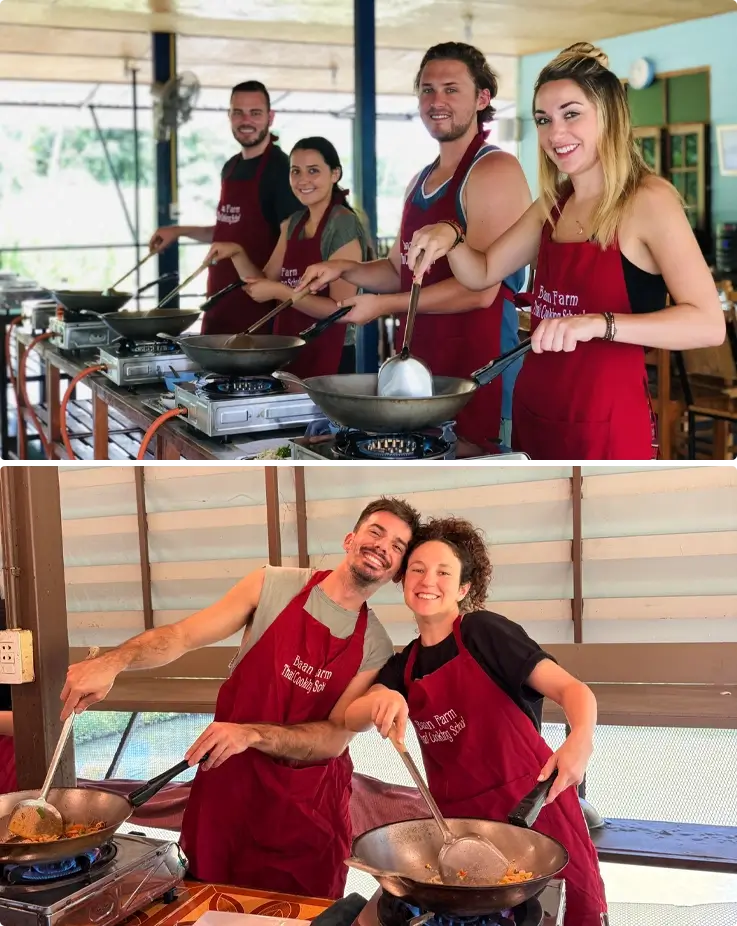 Visitors cooking Thai dishes at Baan Farm Thai Cooking School in Chiang Mai