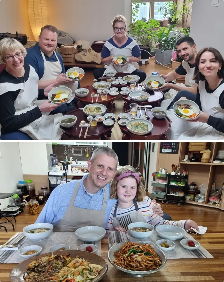 Visitors enjoying a meal prepared during a cooking class in Busan