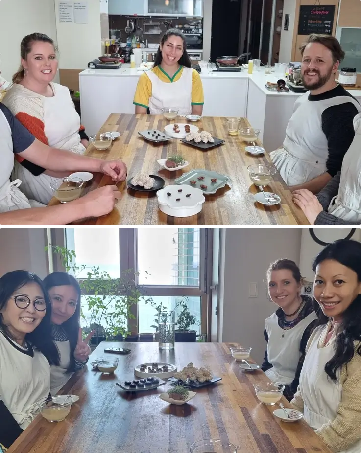 Visitors enjoying tea and dessert at Korean food cooking class in Busan