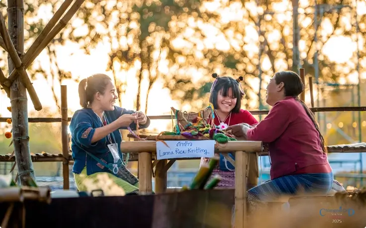 Visitors experiencing Lanna Rice Knitting at Chiang Mai CAD New Year Countdown 2026