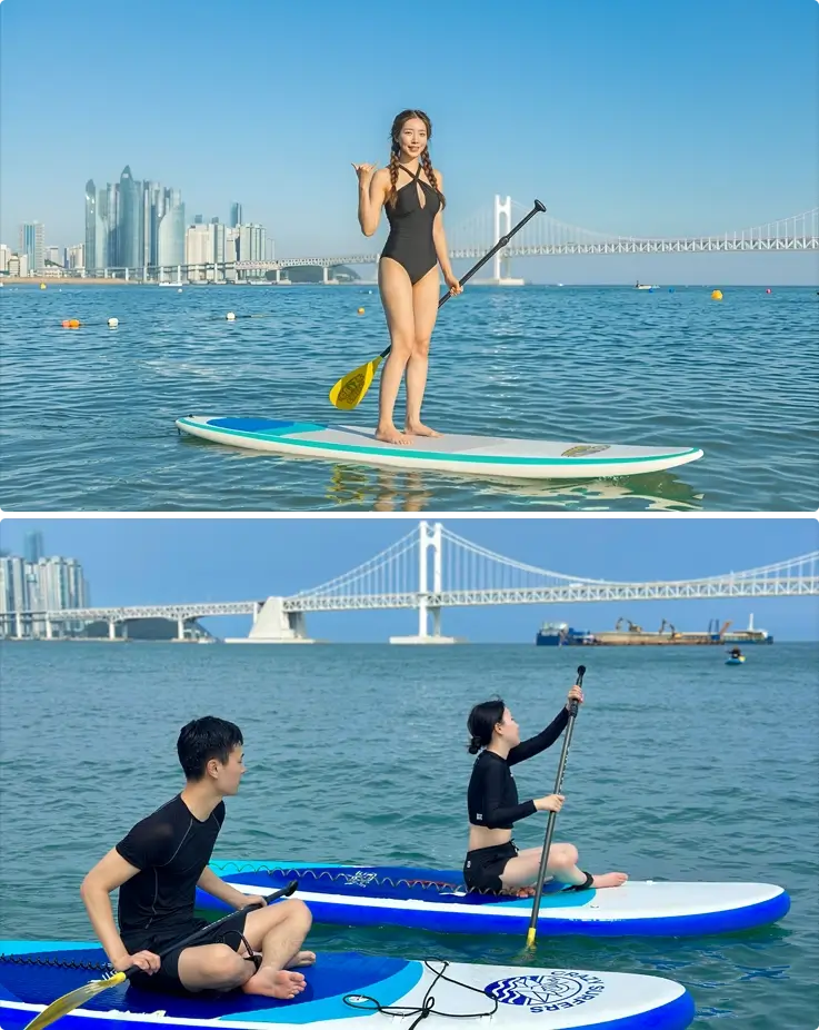 Visitors enjoying paddleboarding at Gwangalli Beach