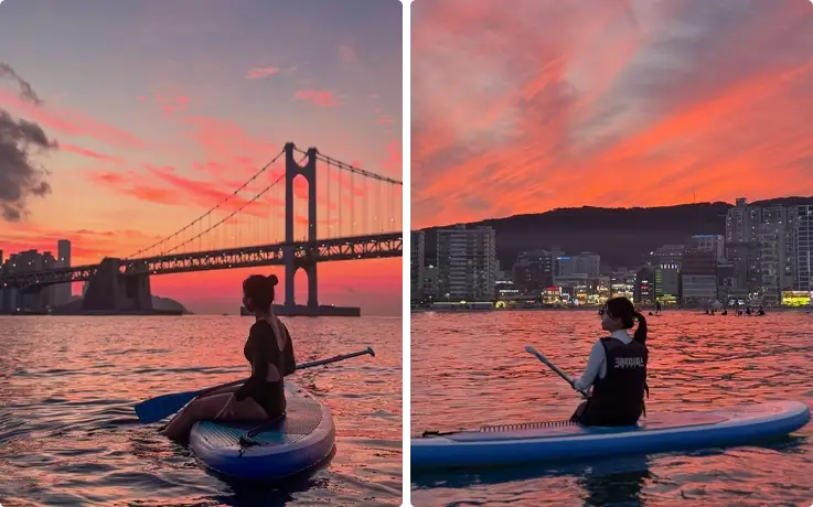 Visitors enjoying sunset paddleboarding at Gwangalli Beach