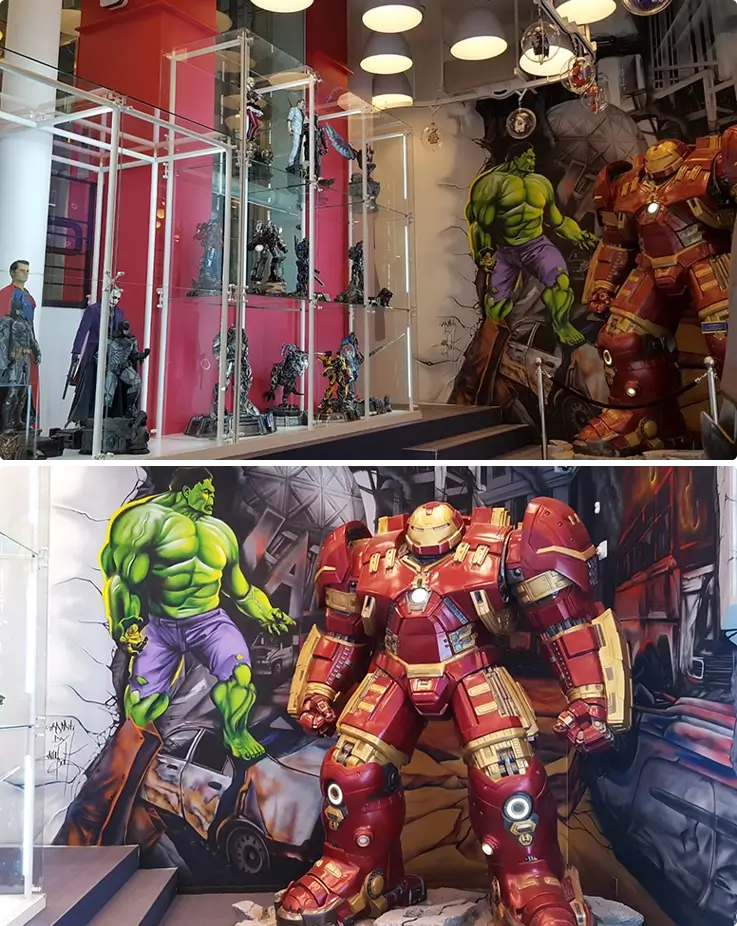 Exhibition on the B2 floor of Figure Museum W featuring figures in various sizes and supercar die-cast models.