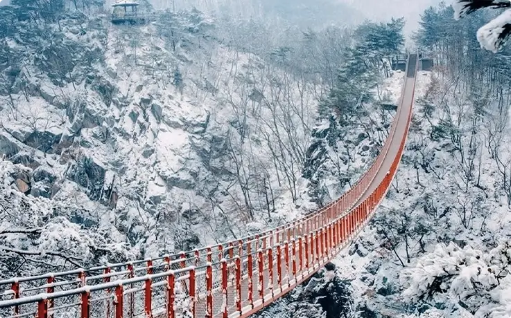Gamaksan Suspension Bridge covered in snow during winter