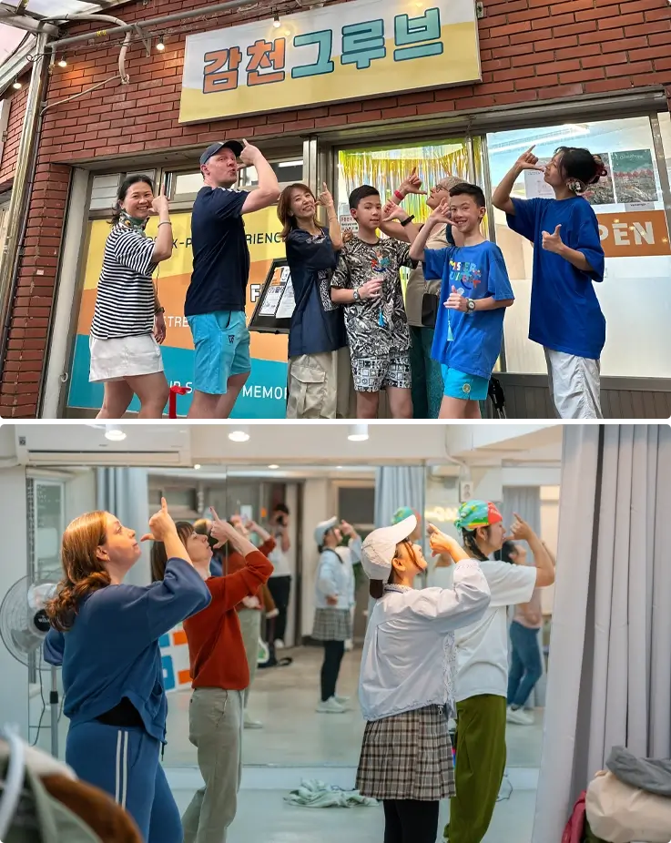 Visitors practicing dance moves at a dance class in Gamcheon Groove in Busan