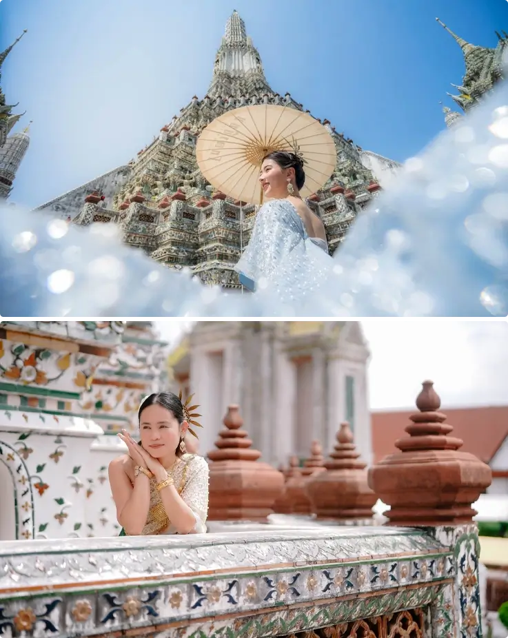 Visitors taking photos in Thai costumes near Wat Arun