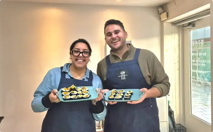 Visitors with gimbap they made at Gyeongju Kitchen