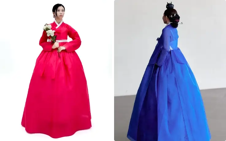 Hanbok rental in Busan by Hanminyeo featuring traditional red and blue Hanboks.