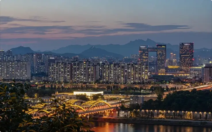 Night view of illuminated Seoul from Yongyangbong Jeojeong Park.