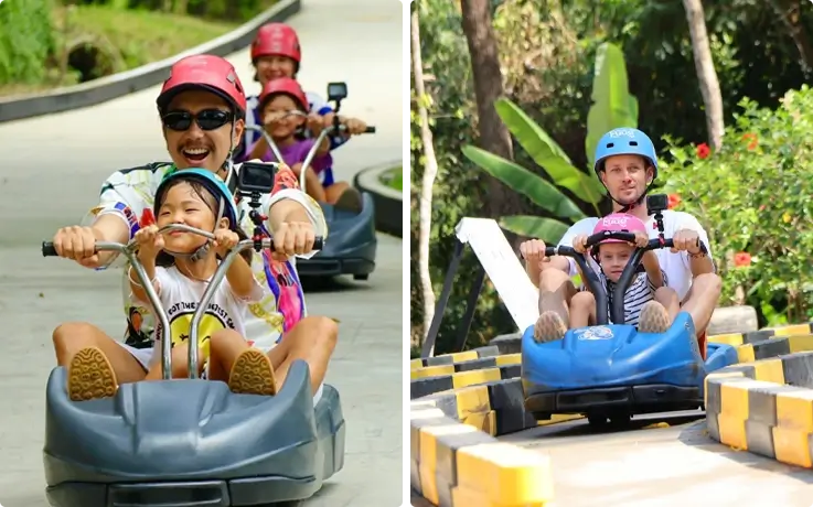 Visitors riding the luge at Hanuman Luge Phuket with children in front