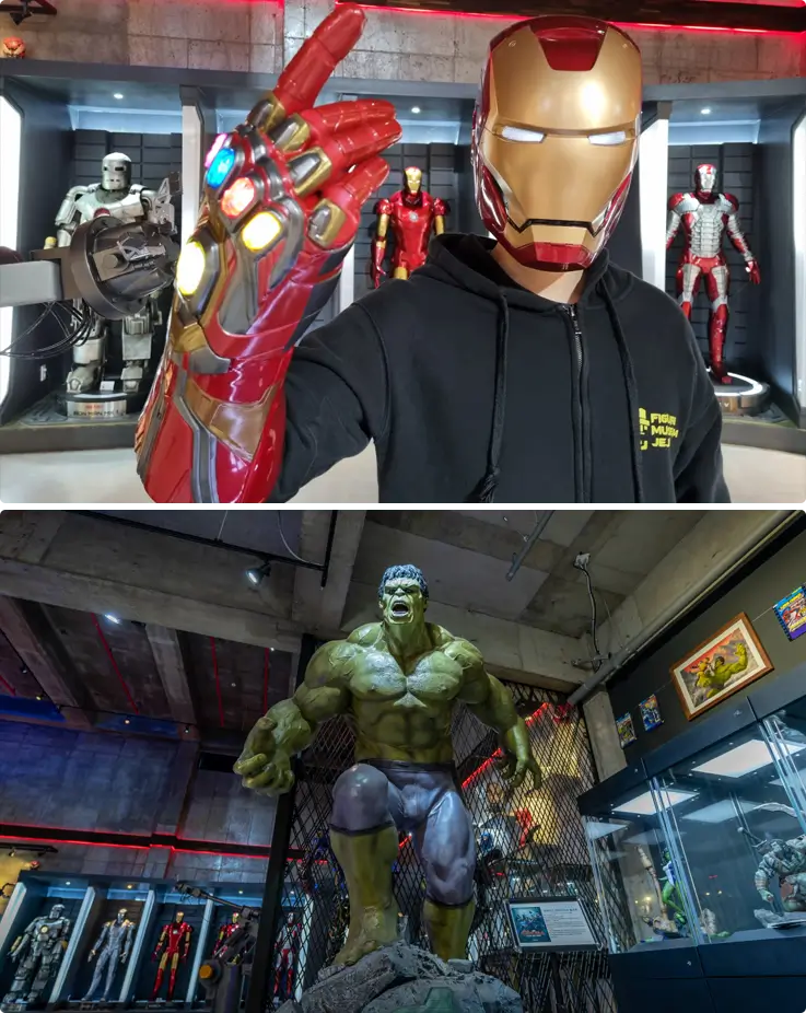 Visitor wearing Iron Man gloves and mask on top and Hulk figure on the bottom at Jeju Figure Museum
