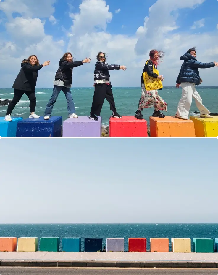 Colorful barriers in Dodu Rainbow Coastal Road in Jeju Island