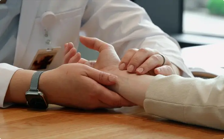 Visitor receiving pulse diagnosis at Limda K-Medical Clinic in Busan