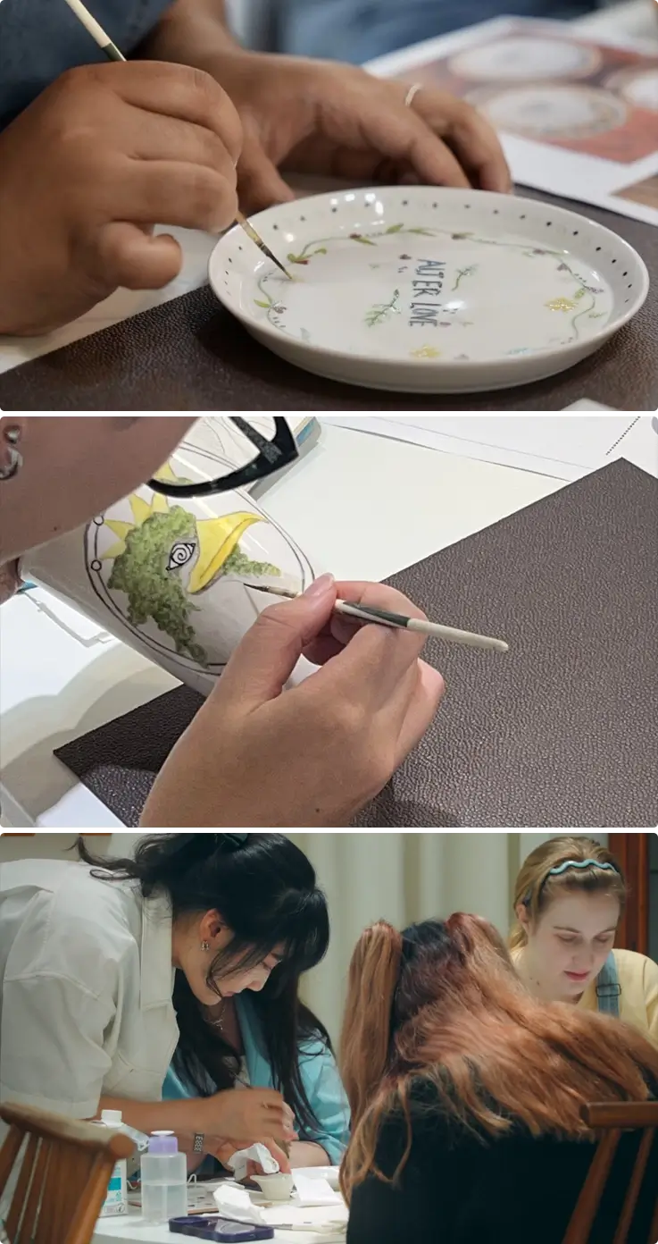 Visitors painting porcelain in a pottery class in Yangsan