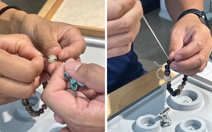Visitors making prayer beads bracelet in Kyoto