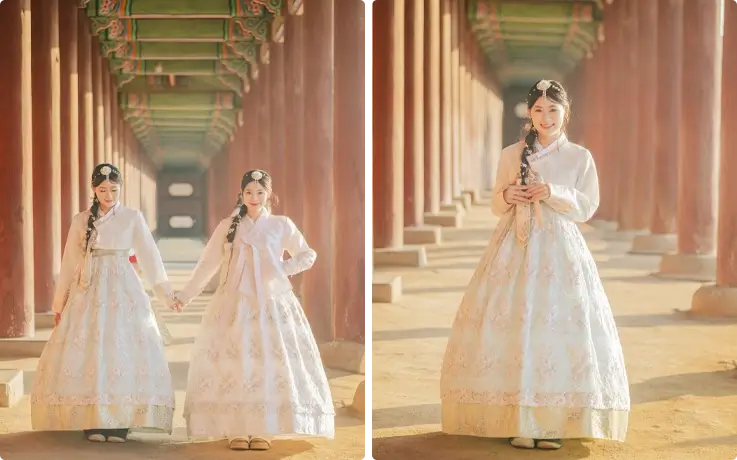 Visitors posing for a professional photoshoot at Gyeongbokgung Palace