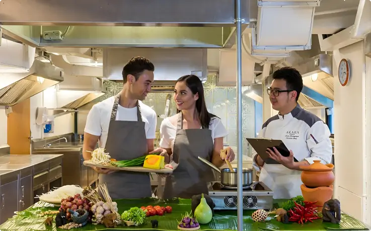 Visitors learning about herbs and spices at Roschas Culinary School in Bangkok