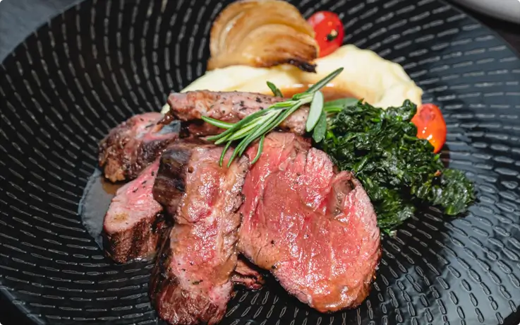 Charcoal grilled meat served in stock room buffet at Kimpton Maa-Lai Hotel in Bangkok