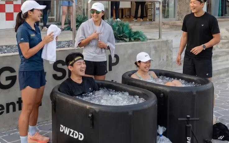Visitors experiencing ice bath at Surfholic Songjeong in Busan