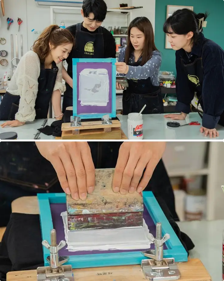 Visitors learn silkscreen printing at a workshop in Daegu