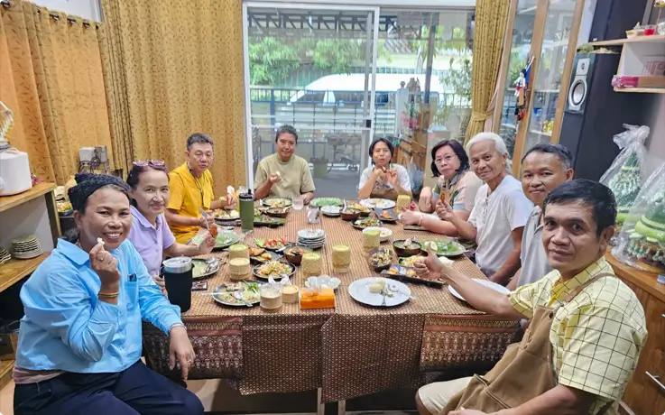 Visitors enjoying dishes they prepared during the Thai cooking class
